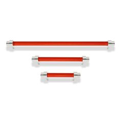 two red and white metal handles on top of each other