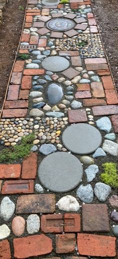 a walkway made out of bricks and stones