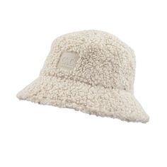 Stay warm and protected from the elements in the CC Sherpa Adjustable Bucket Hat. Its adjustable inner band ensures the perfect fit, while its stylish sherpa material and UVA/UVB sun protection keep you stylish and safe. Enjoy your outdoor activities in comfort and confidence with its lightweight, durable material and easy foldability for travel. Plus, it's distributed by a family-owned USA business and offers truly contagious support and customer service. CC authenticity and quality guaranteed! Beige Bucket Hat, Sherpa Bucket Hat, Usa Business, Floral Jumpsuit, Boutique Brands, Hats For Sale, Pet Hair, Stay Warm, Sun Protection