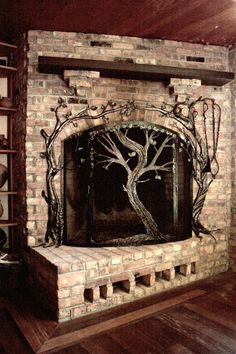 a brick fireplace with a tree on the mantle