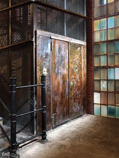 Vintage Industrial Elevator Backdrop - Vintage industrial elevator door photography backdrop with rusted metal and muted glass accents. Industrial Elevator, Rusting Metal, Tiles Background, Urban Fashion Editorial, Industrial Door, Vintage Industrial Design, Warehouse Design, Vintage Industrial Decor, Urban Aesthetic