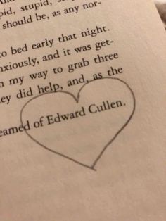 an open book with a drawing of a heart on it's page and the words edward cullenn written in black ink