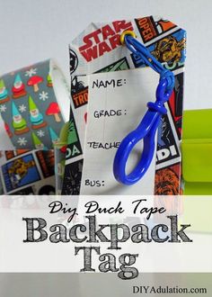 a pair of blue scissors sitting on top of a paper bag with the words diy punch tape back pack tag