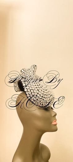 ~LADY DINA~ There's a Beautiful Story behind this creation. Created with an architectural flair and endowed with jewels, this haute beauty is Sure To Be The S💎P💎A💎R💎K💎L💎E💎 at your next gala!  The chapeau is a little weighty and delicate, therefore requiring attentive handling.  H👑E👑A👑V👑Y👑 Is The CROWN! All of our creations are exclusive designs and are gifts of originality. We believe in embracing our gift of individuality and sharing with the world what has been bestowed upon us. As always ENJOY and do not forget to pass it on to the "darling ladies!"💕💕 *All work is copyright and may not be reproduced without permission from the owner. Exclusively yours, Designs By Hope👒 There's always room to do what you l*o*v*e.~ Couture Hats, Hat Accessories, Beautiful Story, Handmade Gift Wrap, Beautiful Stories, The Crown, Exclusive Designs, A R, Caps Hats