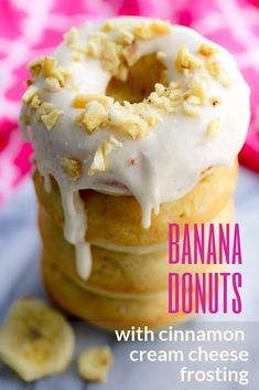 banana donuts with cinnamon cream cheese frosting are stacked on top of each other