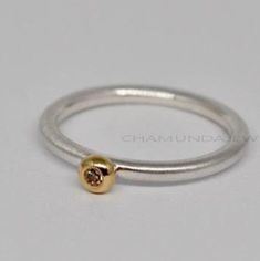 "Sterling Silver Sphere Ring, Ball Silver Ring, Geometric Globe Ring, Plain Silver Band Ring, Ball Silver Ring, Minimalist Band Ring PRODUCT:- SKU:-NF 76206 BR METAL:- 925 Sterling silver STYLE:- Plain Band Jewelry Type : Ring Manufacture By Chamundajeweller925 Goal:- 100% genuine Customer Satisfaction, 925per 1000 % Sterling silver stamp on all the item > my all item is in 925 sterling silver > our design are made in kad (matrix) and made by handmade >please visit my shop and give your feedback Kugel Ring, Sphere Ring, Ring Geometric, Plain Bands, Spinner Rings, Band Jewelry, Silver Style, Ring Minimalist, Silver Band Ring