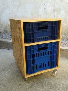 two blue crates sitting on top of each other