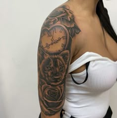 a woman with a clock and roses tattoo on her arm is posing for the camera