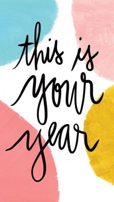 this is your year written in black ink on a multicolored background with the words,'this is your year '