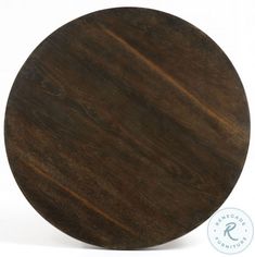 a round wooden table top on a white background