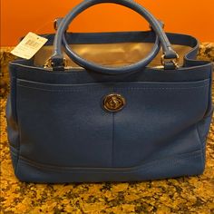 This Is A Fabulous Shade Of Blue Leather! Light Blue Double Handle Bag With Top Carry Handle, Light Blue Leather Bag With Top Carry Handle, Light Blue Top Handle Bags For Office, Blue Top Handle Shoulder Bag, Luxury Blue Bag For Everyday Use, Blue Top Handle Bag For Office, Blue Top Handle Travel Bag, Light Blue Top Handle Shoulder Bag With Gold-tone Hardware, Blue Top Handle Shoulder Bag For On-the-go