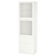 a tall white cabinet with two glass doors