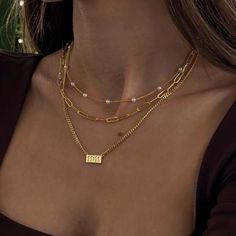 Meet our new Lover Girl Necklace, a basic pearl necklace with a twist. This stunning necklace can spice up any outfit you wear. Let this baby shine on its own, or pair it with our Girly Pearly Necklace for the perfect stack. #ad #affiliatelink

FOLLOW FOR MORE 🫡

jewelry aesthetic, gold jewelry aesthetic, gold necklace woman, summer jewelry, gold jewelry fashion, gold jewelry simple necklace, necklace stack, gold jewelry, gold jewelry stack, necklace layering ideas, necklace layering Preppy Jewelry, Stacked Necklaces, Jewelry Accessories Ideas, Classy Jewelry, Jewelry Essentials, Girl Jewelry, Jewelry Lookbook, Stacked Jewelry, Link Up