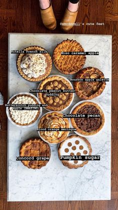 pies are arranged on a table with words describing the different types of pies