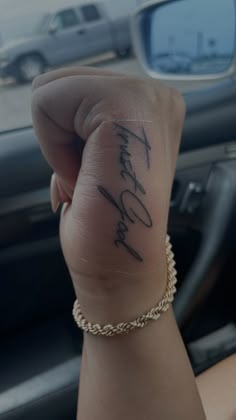 TATTOO Trust God Tattoo On Hand, Brooklyn Frost Hand Tattoo, Trust God Hand Tattoo, Trust God Tattoo Ideas, Small Hand Tattoos For Women Words, Blessed Hand Tattoos For Women, Tattoo Ideas Hand Women, Cute Tattoos Black Women, God Got Me Tattoo