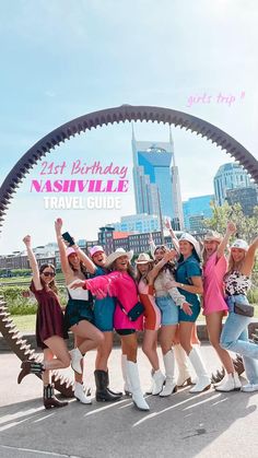 a group of women posing for a photo in front of a circular arch with the words first birthday nashville travel guide