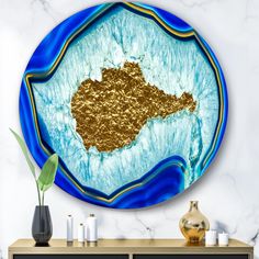 a blue and gold wall hanging in a living room