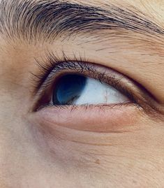 the eye of a person with blue eyes