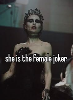 a woman in a black dress with the words she is the female joker