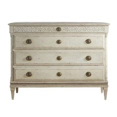 an old white dresser with drawers and knobs on the bottom, against a white background