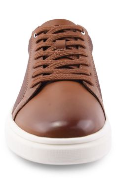 With a sleek monochromatic design, this white-sole sneaker adds casual style to a classic low-top sneaker. Synthetic upper, lining and sole Imported Brown Leather High-top Sneakers With Translucent Outsole, Modern Brown Sneakers With Translucent Outsole, Casual Custom Sneakers With Gum Sole, Plain Toe Sneakers With Textured White Sole, Casual Brown Low-top Slip-on Sneakers, Casual Sneakers With White Sole, Streetwear Sneakers With Textured Sole, Brown Low-top Slip-on Sneakers For Streetwear, Plain Toe Synthetic Sneakers For Streetwear