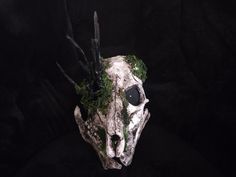 This listing is for the Deer Skull Wendigo Mask Version 2, an ancient relic that cursed its wearer after dawning the aged bones. For some it was the inability to take the mask off and others it was a hunger never to be satisfied. As if a restless spirit was grown into the item itself. Feel free to ask about customization for the mask. The mask is lightweight, comfortable to wear, and usually fitted for average adult sized faces.  This mask is made to order, so please allow me 1-2 weeks to craft Wendigo Mask, Paper Mache Mask, Deer Skull, Mask Halloween, Deer Skulls, Halloween Mask, Costume Mask, Halloween Masks, Latex Free