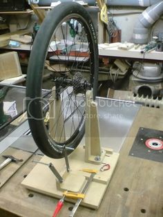 a bicycle wheel being worked on in a shop