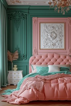 a bedroom with green walls and pink bedding, chandelier above the headboard