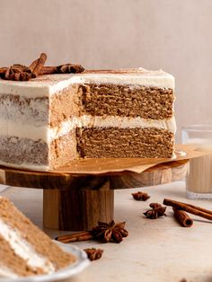 a slice of cake sitting on top of a wooden plate