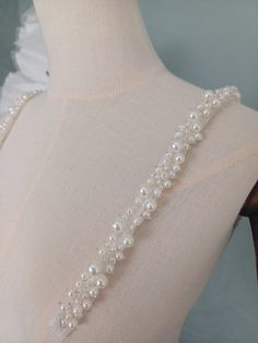 Bespoke/Made to Order Order includes: 1 Pair of Bridal Straps. They need to be sewed/pinned on the inside of your dress. Please check on the YouTube link below to see how and where to pin/measure the straps. https://youtu.be/2V_z7fmXQWc * All photos are unedited; what you see is what you get. DELIVERY The standard delivery service we use for the UK is Royal Mail 2nd class service which normally takes 2-3 working days and no tracking number is available. Royal Mail international standard service Bridal Straps, Pearl Straps, Bridal Belts, Wedding Veil Accessories, Bridal Separates, Pearl Dress, Pearl Bridal, Youtube Link, Bridal Belt