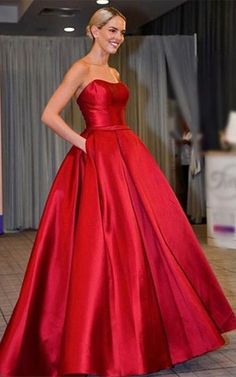 red satin pocket strapless long evening party dress #gown #reddress #longdress #formalgown #pageantdress #prom2021 #promdress Red A-line Satin Dress For Prom, Fitted Satin Ball Gown, Fitted Satin Ball Gown Dress, Satin Dress With Pleated Bodice And Sweetheart Neckline, Satin Ball Gown For Formal Occasions, Bridesmaid Satin Dress With Sweetheart Neckline For Prom, Debutante Ball Satin Ball Gown, Gown For Wedding And Prom Season, Solid Color Gown For Wedding And Prom Season