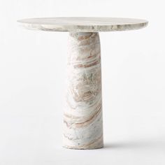 a white marble table on a white background