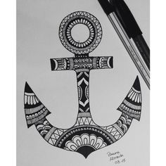 a drawing of an anchor with geometric designs