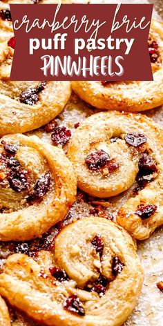 cranberry brie puff pastry pinwheels on a baking sheet with text overlay