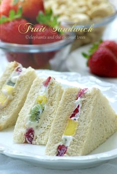 two pieces of fruit sandwich on a white plate