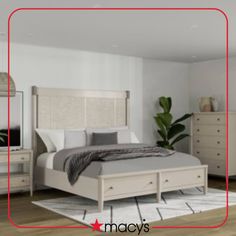 a bed room with a neatly made bed and dressers