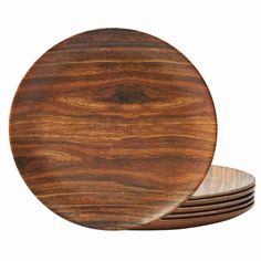 four wooden plates stacked on top of each other