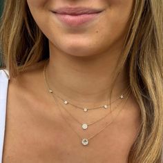 You simply can’t go wrong with a classic diamond necklace and this one takes it to the new level with a captivating round white topaz stone surrounded by dazzling dainty diamonds, this halo solitaire necklace is oh so chic. Details: • 1.47 Total Carat Weight White Topaz • .08 Total Diamond Carat Weight • 24 Pave' Set Round Diamonds • 14k Yellow Gold • Chain Length: Adjustable from 16 inches to 18 inches • Pendant: 8mm • Center Stone Size: 6mm Everyday Gold Necklace, Round Diamond Necklace, Solitaire Necklace, Diamond Solitaire Necklace, Gold Disc, Classic Necklace, Solitaire Necklaces, Disc Necklace, Station Necklace