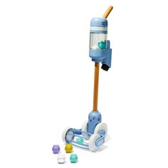 a blue and white toy vacuum with some toys around it