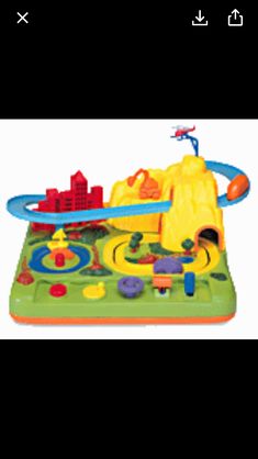 an inflatable play mat with toys on it