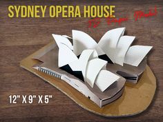 the sydney opera house paper model is on display