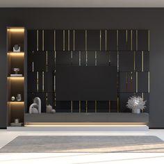 a modern living room with black walls and gold trimmings on the shelves, along with an area rug