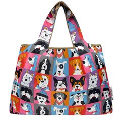 a multicolored bag with dogs on it's front and side handles, hanging from the handle