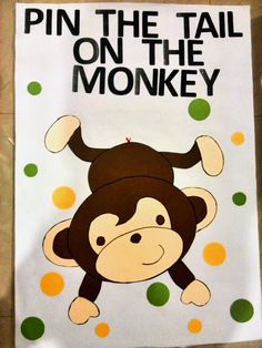 a sign that says pin the tail on the monkey