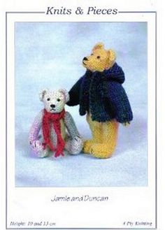 two knitted teddy bears are standing next to each other in front of a white background