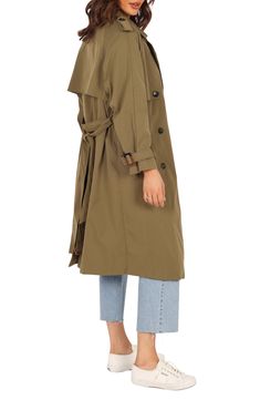 Take your outerwear game up a notch with a classic trench coat featuring utilitarian details including epaulets, a back storm flap and belted cuffs. Front button closure Notched collar Front pockets Removable belt Back vent Lined 100% polyester Hand wash, dry flat Imported Modern Trench Coat, Womens Trench Coat, Rain Coats, Classic Trench Coat, Belted Trench Coat, Trench Coat Black, Leather Trench Coat, Green Coat, Trench Coats Women