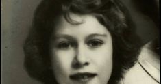 an old black and white photo of a woman