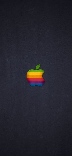 an apple logo is shown on a dark background with the colors of rainbow and red