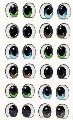 an image of many different colored eyes with white stars on the outside and green around them