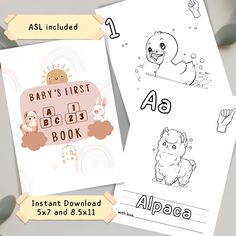 the baby's first alphabet book is on display next to other printables